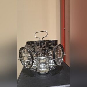 Elegant Silver and Black Glass Set with Holder